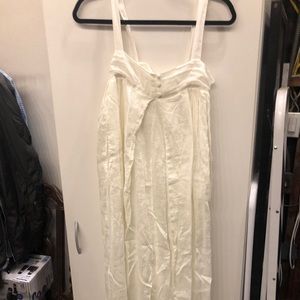 Black Crane linen white jumper with straps